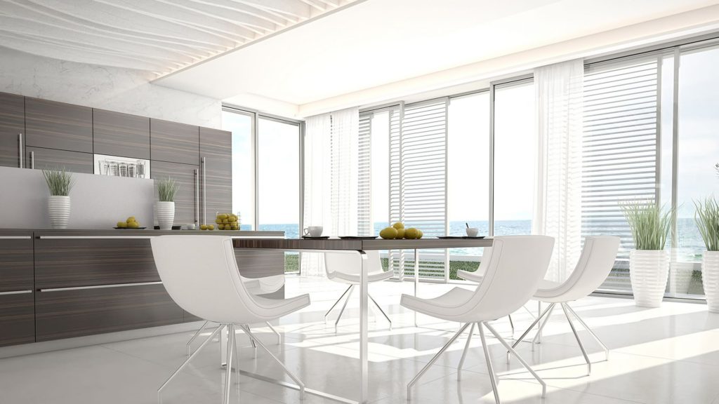 A white room with some chairs and tables