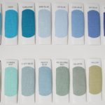 A row of blue paint swatches on top of each other.